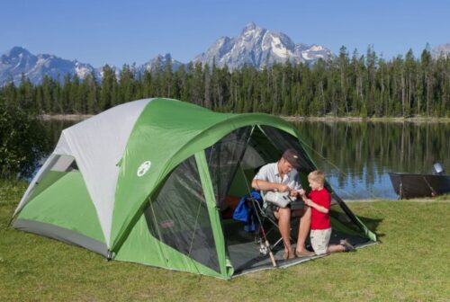 Father & Son camping in a camping tent