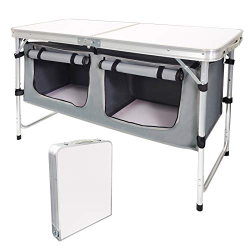 Folding camp kitchen table with storage compartments.