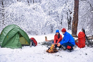 Couple going winter camping