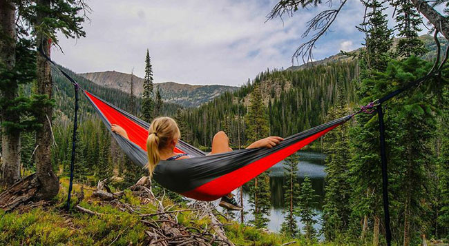 Relaxing in a camping hammock